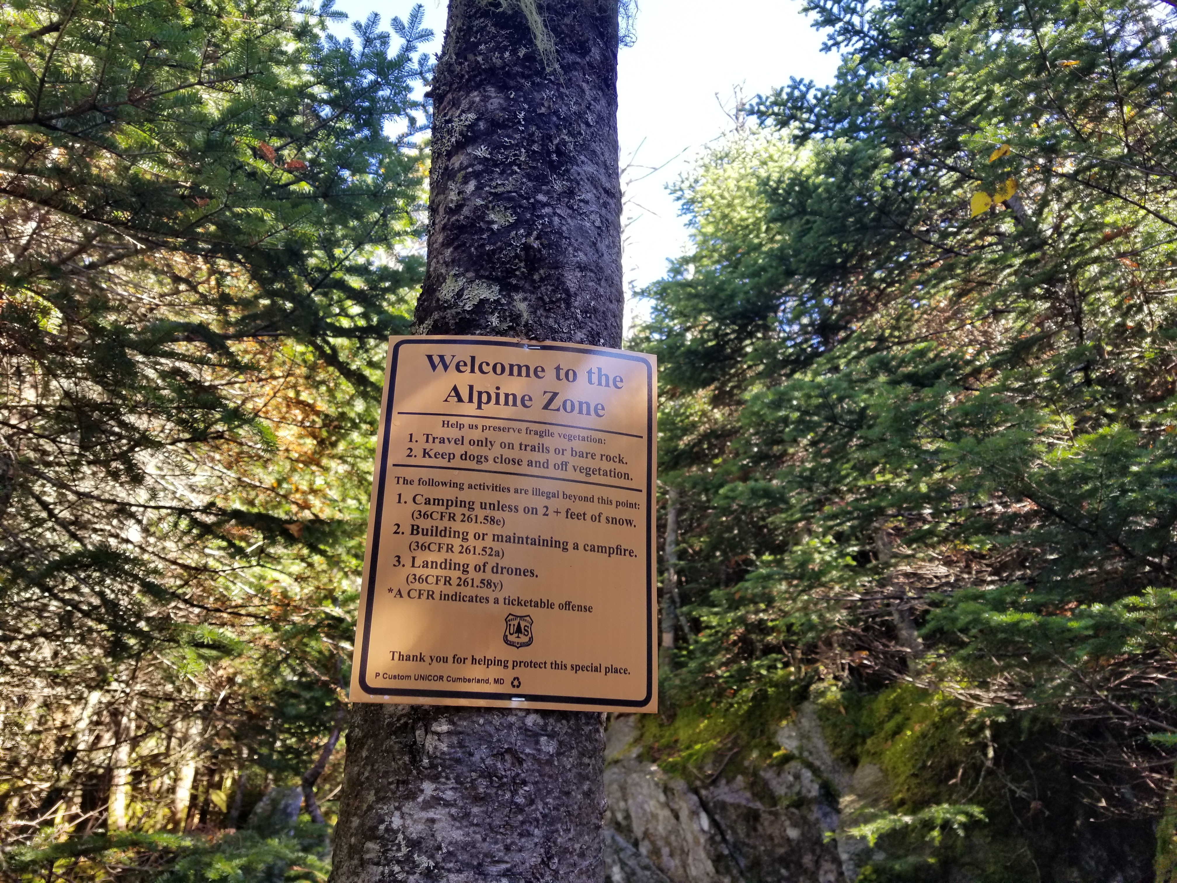 Sign with rules for the Alpine Zone