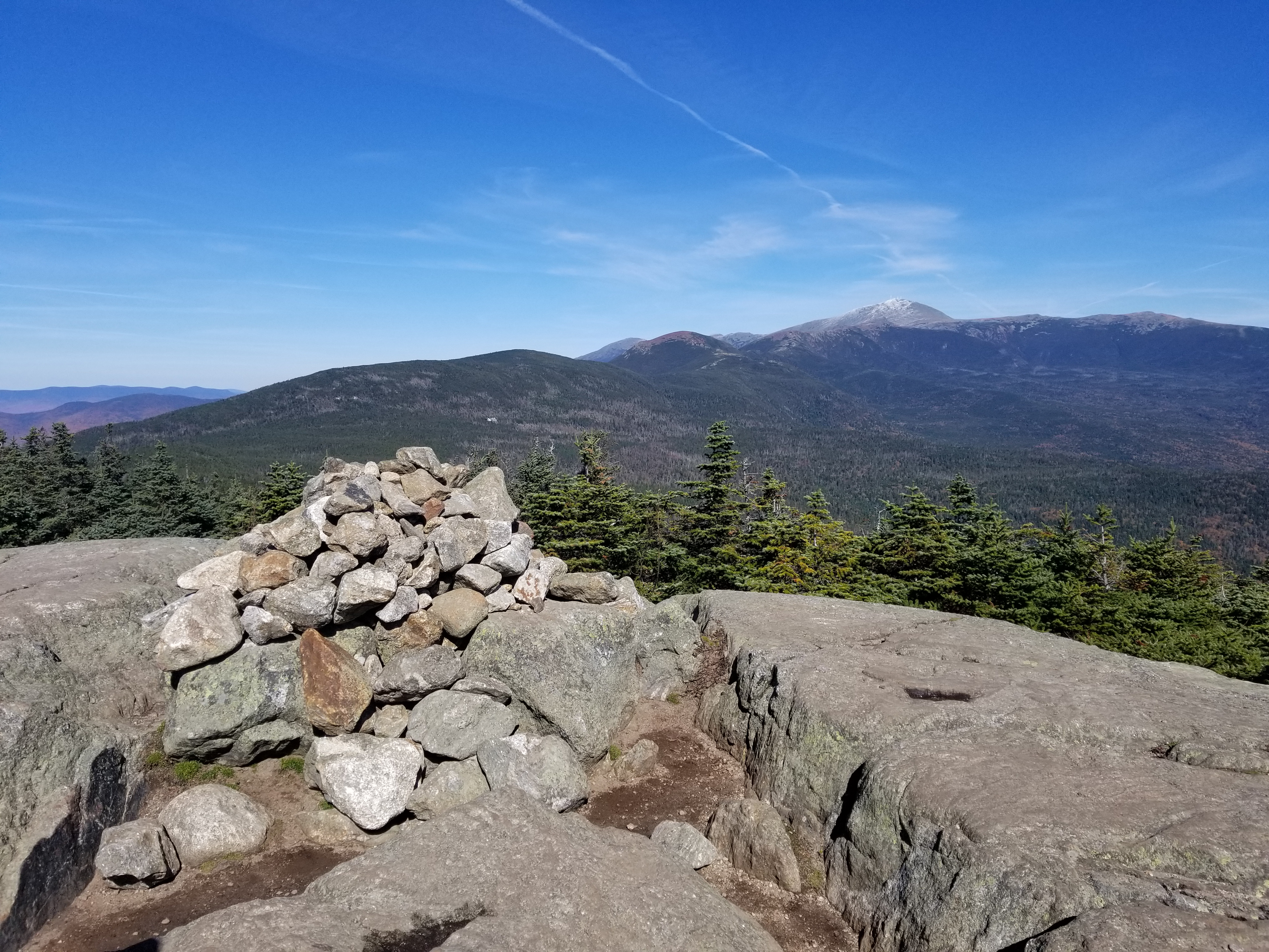 The cairn on the summit, with Washington in the background